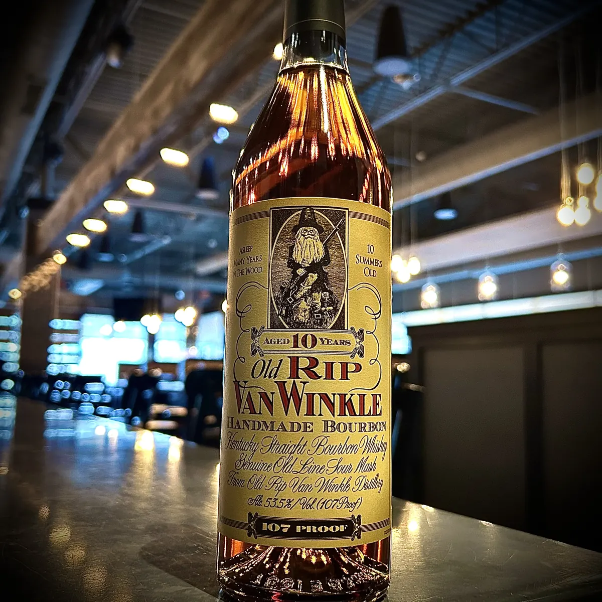 A bottle of Old Rip Van Winkle on the bar